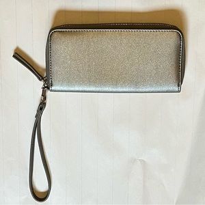 3/$20. Silver wristlet Joe Fresh